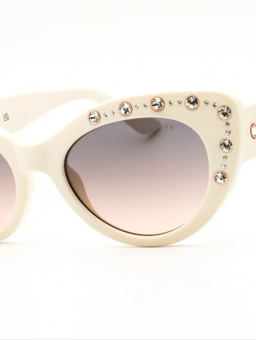 NWT GU00163 Cat eye with rhinestones. Includes case. Size 54